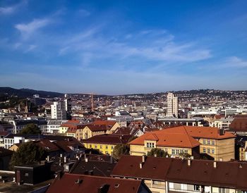 Cityscape against blue sky