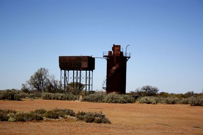 Water tank ruins against clear sky