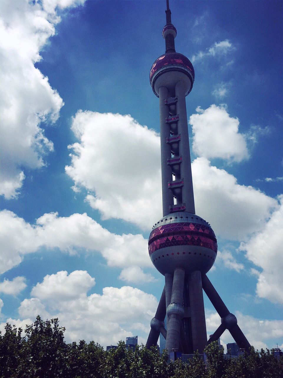 LOW ANGLE VIEW OF COMMUNICATIONS TOWER AGAINST SKY