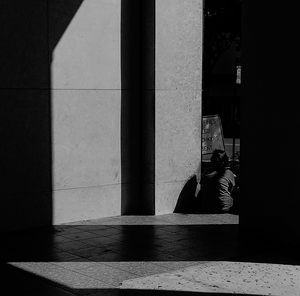 Shadow of man on glass