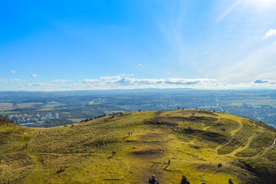 Scenic view of landscape against cloudy sky