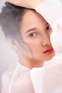 Close-up portrait of beautiful young woman