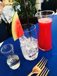 Glass of drink on table