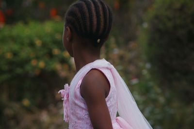 Rear view of girl with braided hair