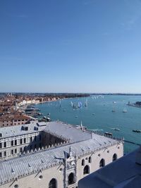 View of palazzo ducale , the sea and sailing boats from the campanile di san marco, venice italy