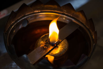 Close-up of burning candle