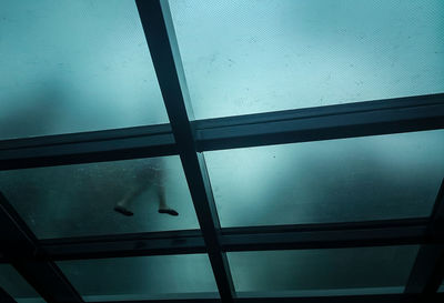 Low angle view of glass ceiling
