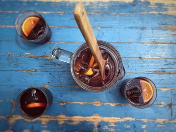 High angle view of lemon ice tea on table