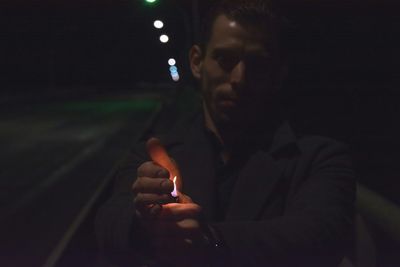 Close-up of man smoking cigarette