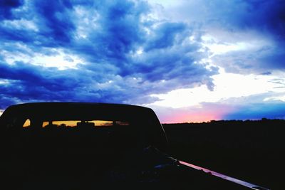 Clouds over landscape at sunset