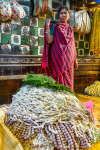 Man standing at market stall