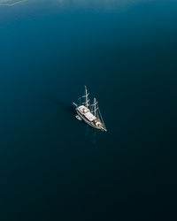 High angle view of sailboat sailing in sea