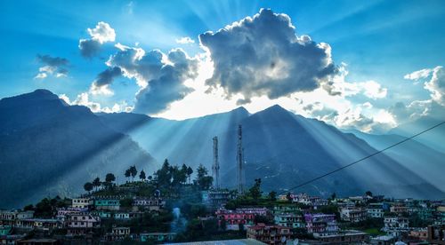 Panoramic view of town against sky