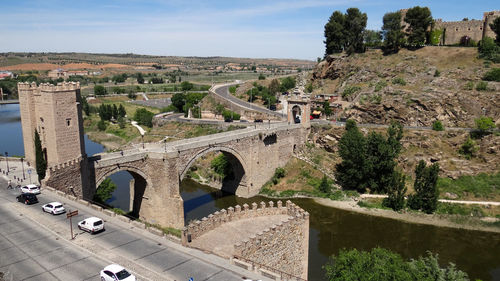 View of arch bridge against sky