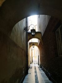 Empty street along walls