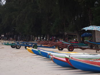 Boats and push carts at beach