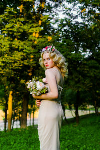 Portrait of young woman outdoors