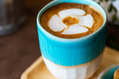 Close-up of coffee cup on table