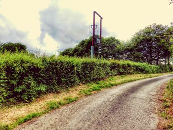 Road passing through field