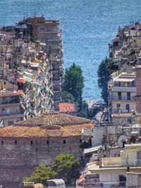 High angle view of town by sea