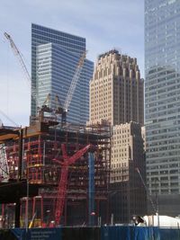 Modern buildings against sky in city