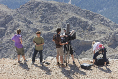 Group of people on mountain road