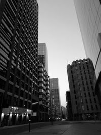 Skyscrapers in city against clear sky