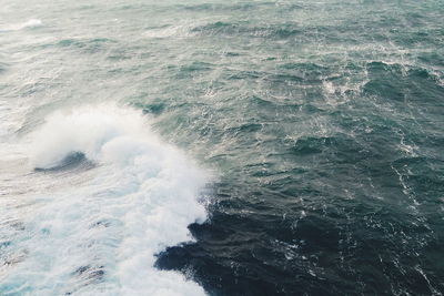 High angle view of waves in sea