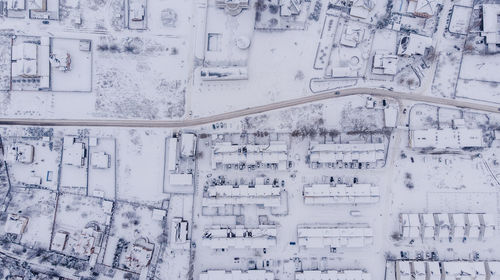 Aerial view on winter village. many houses.