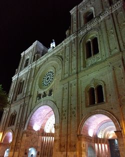 Low angle view of cathedral at night