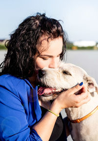 Close-up of woman with dog