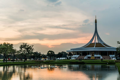 Scenic view of lake against sky during sunset