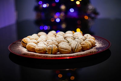 Christmas dinner dessert with bokeh lights background