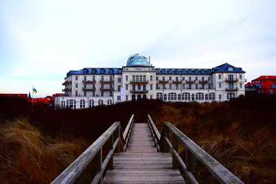 View of building against cloudy sky