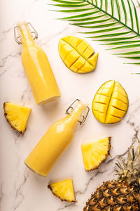 High angle view of yellow fruits on table