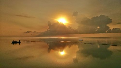 Scenic view of sunset over sea