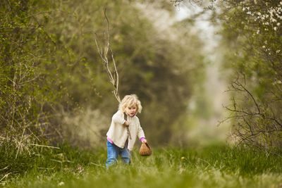 Full length of girl on field