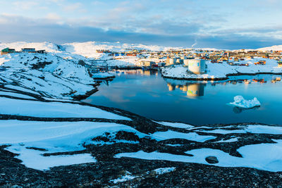 High angle view of snow covered landscape against sky