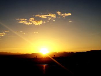Scenic view of silhouette landscape against sky during sunset