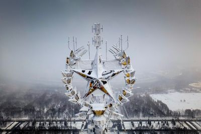 Digital composite image of snowcapped mountain against sky