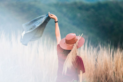 Close-up of woman in field