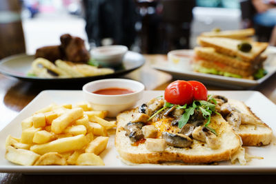 Close-up of food served on table