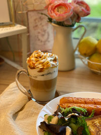 Close-up of coffee served on table