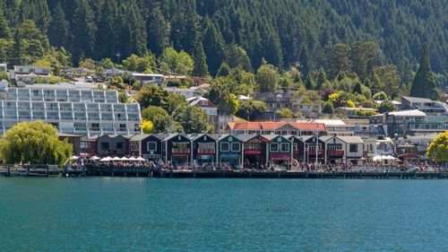 View of buildings by sea