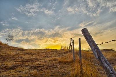 Scenic view of landscape against sky during sunset