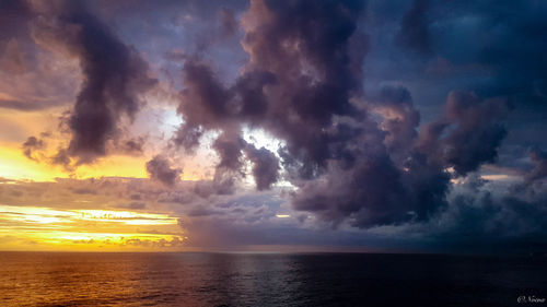 Scenic view of sea against sky during sunset