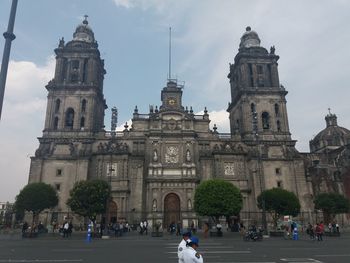 Group of people in front of cathedral