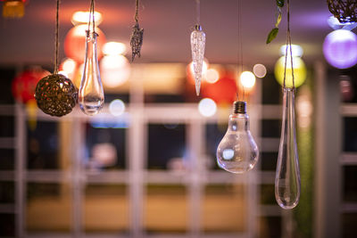 Close-up of light bulbs hanging