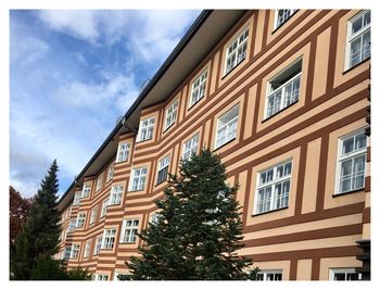 Low angle view of residential building against sky