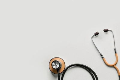 Close-up of stethoscope against white background